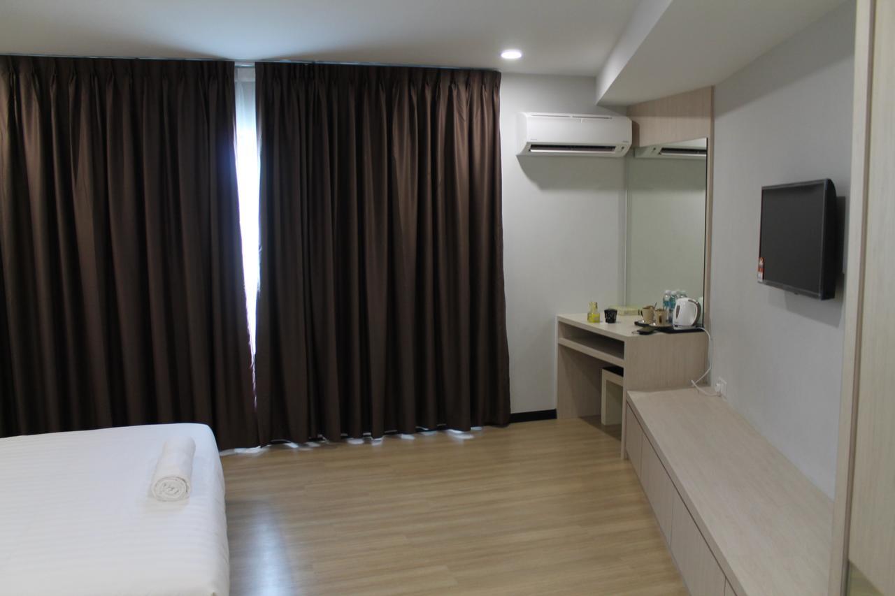 The Velton Inn บินตูลู ภายนอก รูปภาพ